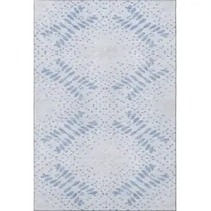 Photo of Blue And Ivory Floral Washable Area Rug With UV Protection