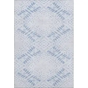Photo of Blue And Ivory Floral Washable Area Rug With UV Protection