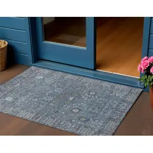 Photo of Blue And Ivory Floral Washable Indoor Outdoor Area Rug