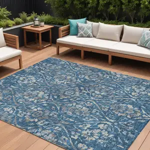 Photo of Blue And Ivory Floral Washable Indoor Outdoor Area Rug
