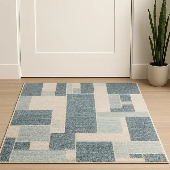 Blue And Ivory Geometric Area Rug Photo 1