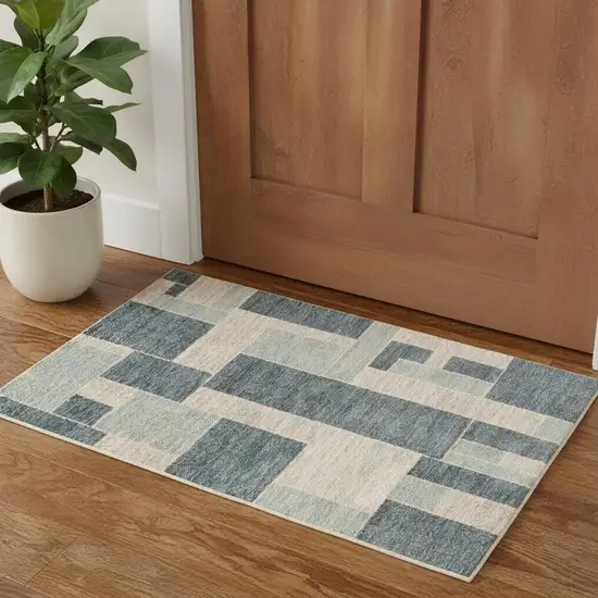 Blue And Ivory Geometric Area Rug Photo 1