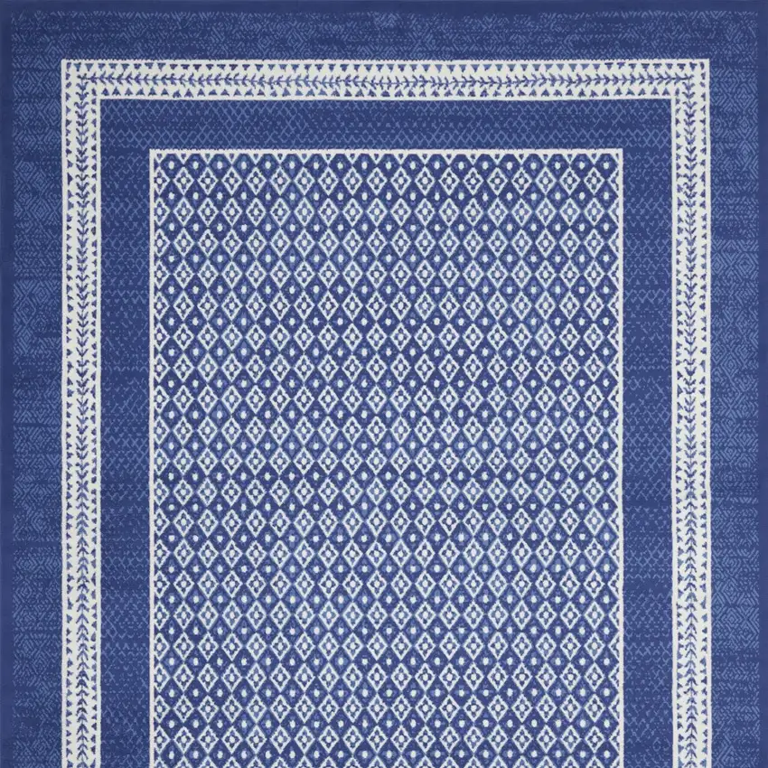 Blue And Ivory Geometric Distressed Area Rug Photo 9