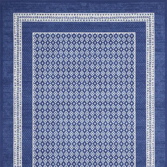 Blue And Ivory Geometric Distressed Area Rug Photo 9