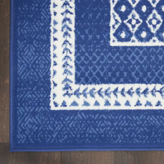 Blue And Ivory Geometric Distressed Area Rug Photo 8