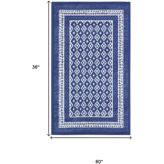 Blue And Ivory Geometric Distressed Area Rug Photo 3