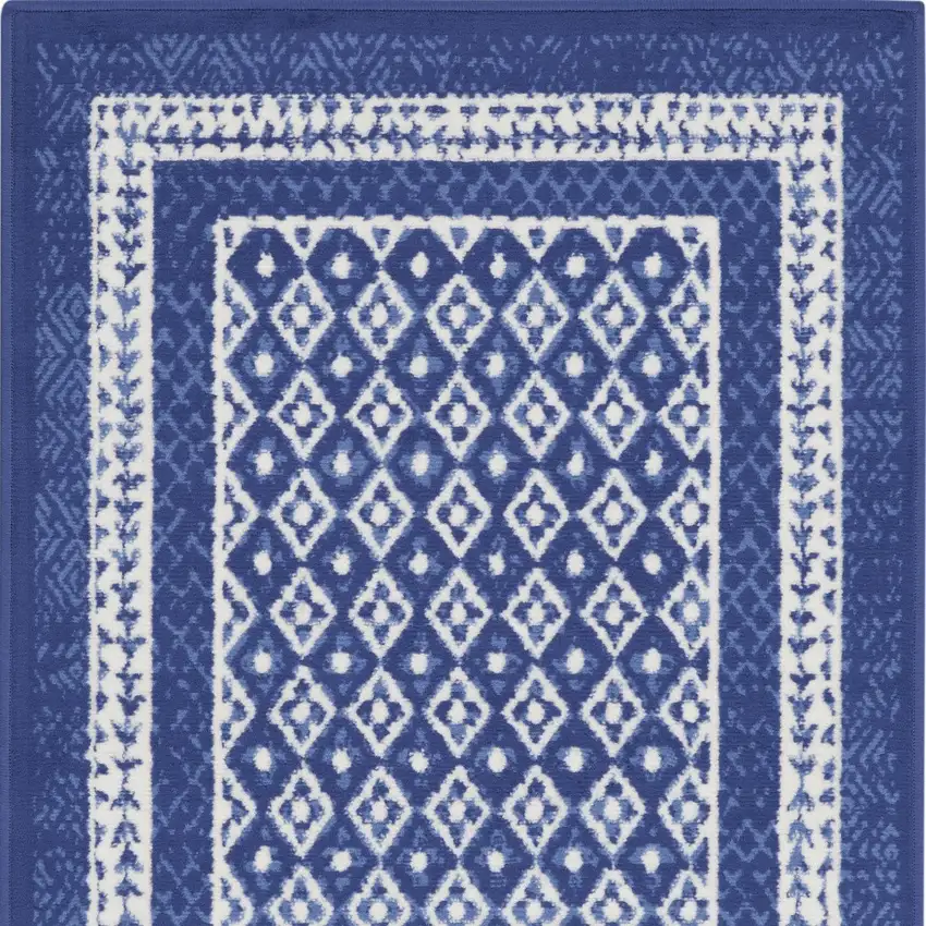Blue And Ivory Geometric Distressed Area Rug Photo 8