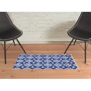 Photo of Blue And Ivory Geometric Distressed Area Rug
