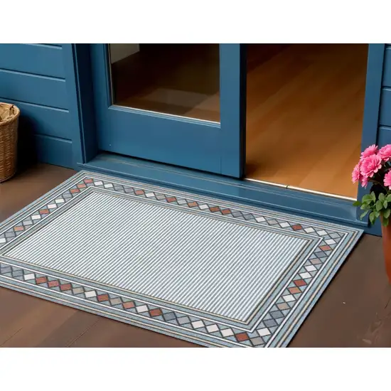 Blue And Ivory Geometric Indoor Outdoor Area Rug Photo 1