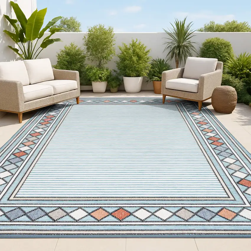 Blue And Ivory Geometric Indoor Outdoor Area Rug Photo 4