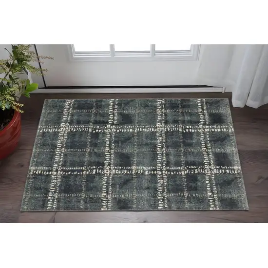 Blue And Ivory Geometric Power Loom Stain Resistant Area Rug Photo 1