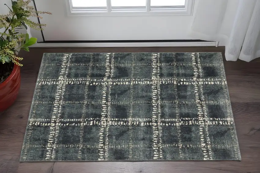 Blue And Ivory Geometric Power Loom Stain Resistant Area Rug Photo 1