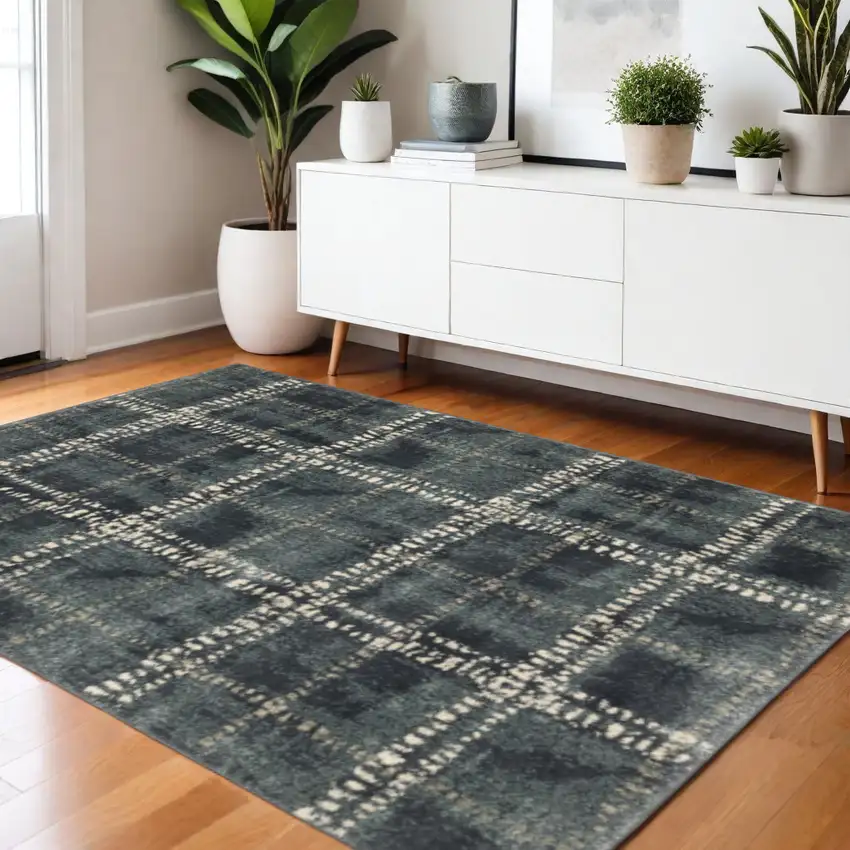 Blue And Ivory Geometric Power Loom Stain Resistant Area Rug Photo 1