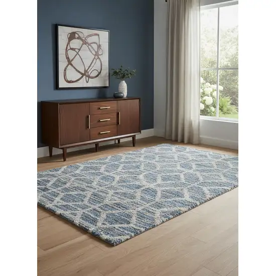 Blue And Ivory Geometric Power Loom Stain Resistant Area Rug Photo 1
