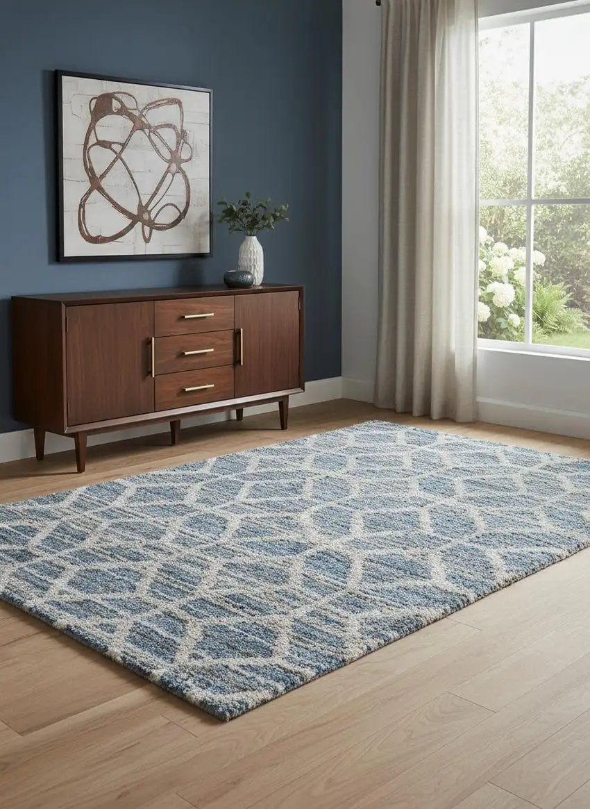 Blue And Ivory Geometric Power Loom Stain Resistant Area Rug Photo 1