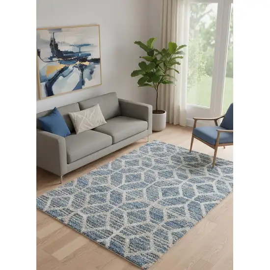 Blue And Ivory Geometric Power Loom Stain Resistant Area Rug Photo 1