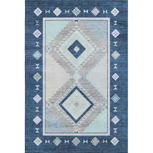 Photo of Blue And Ivory Geometric Washable Area Rug With UV Protection