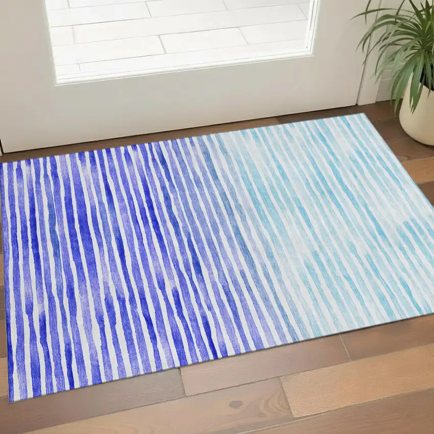 Blue And Ivory Geometric Washable Area Rug With UV Protection Photo 1