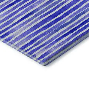 Photo of Blue And Ivory Geometric Washable Area Rug With UV Protection