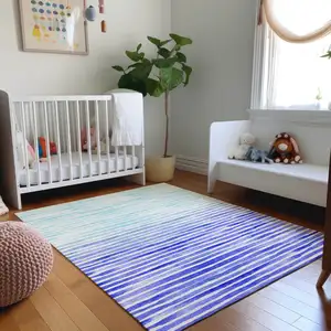 Photo of Blue And Ivory Geometric Washable Area Rug With UV Protection