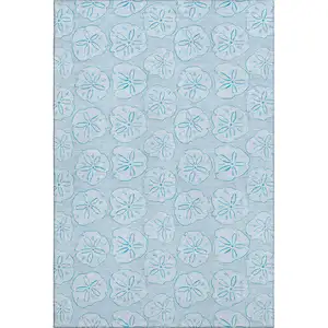 Photo of Blue And Ivory Geometric Washable Area Rug With UV Protection
