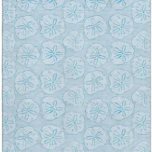 Photo of Blue And Ivory Geometric Washable Area Rug With UV Protection