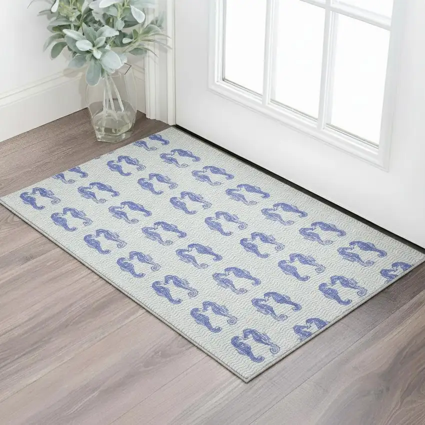 Blue And Ivory Geometric Washable Area Rug With UV Protection Photo 1