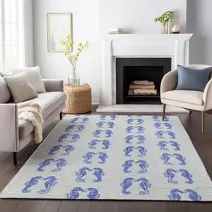 Photo of Blue And Ivory Geometric Washable Area Rug With UV Protection