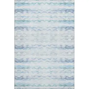 Photo of Blue And Ivory Geometric Washable Area Rug With UV Protection