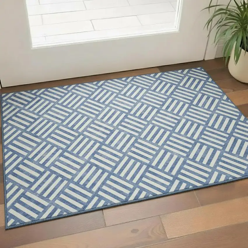 Blue And Ivory Geometric Washable Area Rug With UV Protection Photo 1