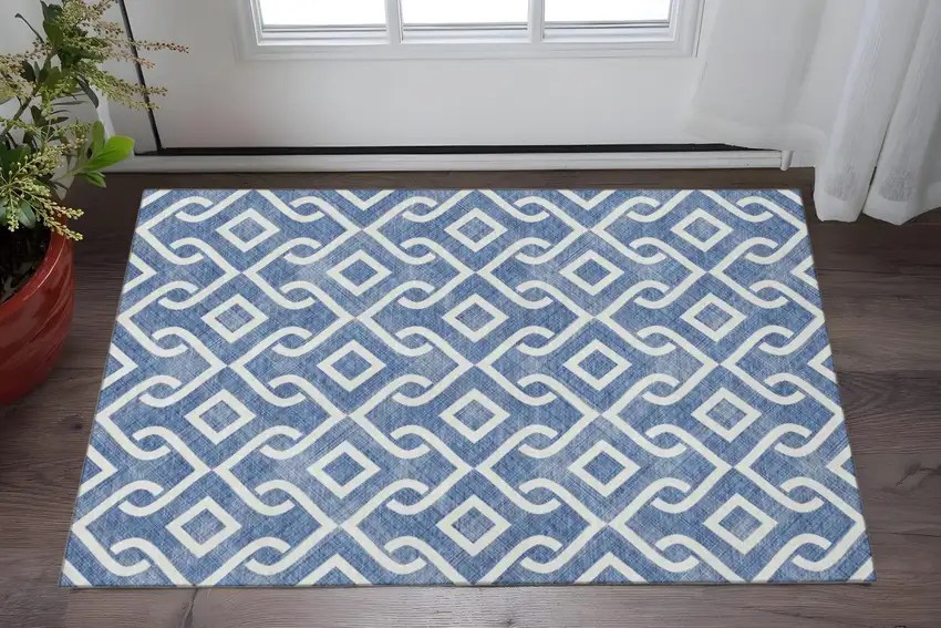 Blue And Ivory Geometric Washable Area Rug With UV Protection Photo 2