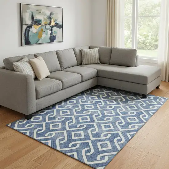 Blue And Ivory Geometric Washable Area Rug With UV Protection Photo 1