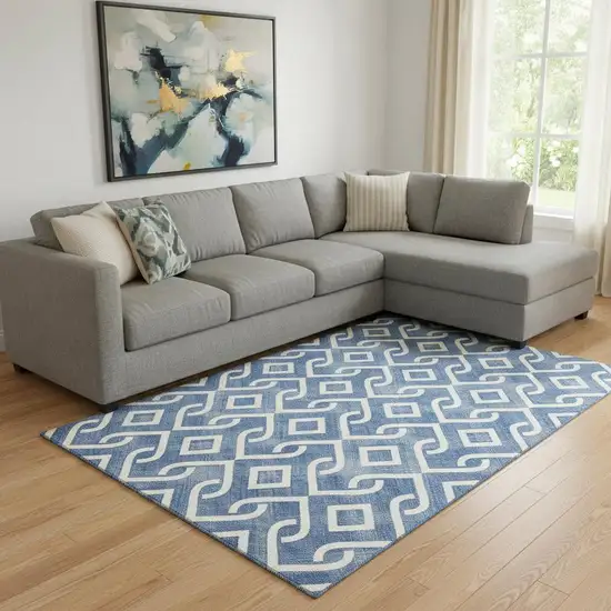 Blue And Ivory Geometric Washable Area Rug With UV Protection Photo 1