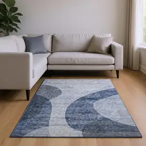 Photo of Blue And Ivory Geometric Washable Area Rug With UV Protection