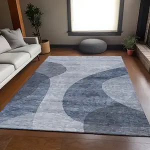 Photo of Blue And Ivory Geometric Washable Area Rug With UV Protection