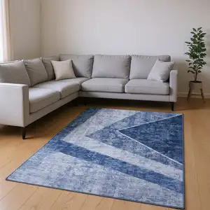 Photo of Blue And Ivory Geometric Washable Area Rug With UV Protection