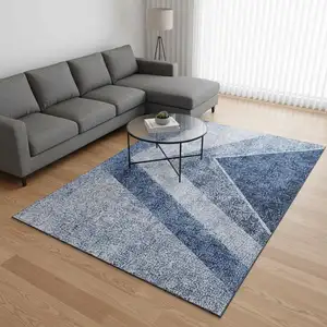 Photo of Blue And Ivory Geometric Washable Area Rug With UV Protection