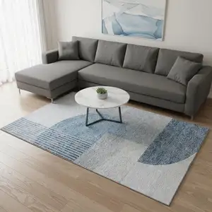 Photo of Blue And Ivory Geometric Washable Area Rug With UV Protection