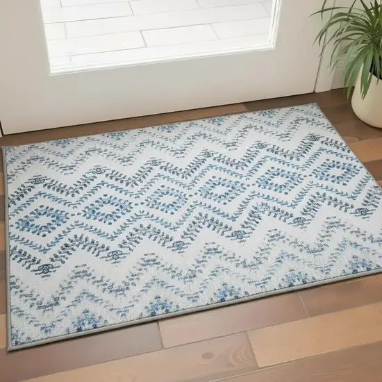 Blue And Ivory Geometric Washable Area Rug With UV Protection Photo 2