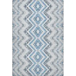 Photo of Blue And Ivory Geometric Washable Area Rug With UV Protection