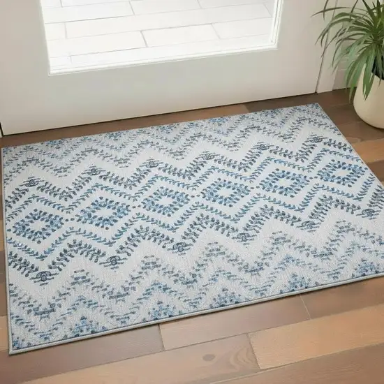 Blue And Ivory Geometric Washable Area Rug With UV Protection Photo 1