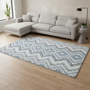 Photo of Blue And Ivory Geometric Washable Area Rug With UV Protection