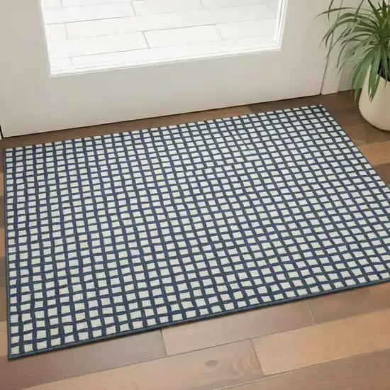 Blue And Ivory Geometric Washable Area Rug With UV Protection Photo 1