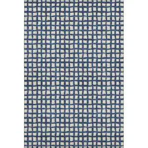 Photo of Blue And Ivory Geometric Washable Area Rug With UV Protection