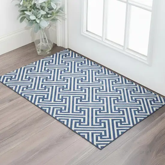 Blue And Ivory Geometric Washable Area Rug With UV Protection Photo 1
