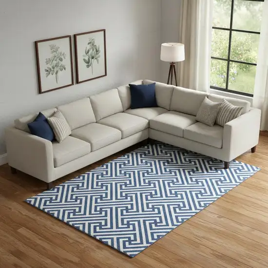 Blue And Ivory Geometric Washable Area Rug With UV Protection Photo 1