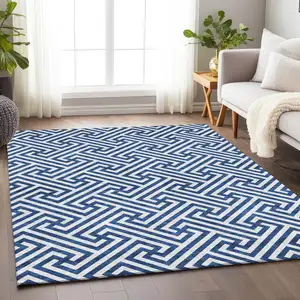 Photo of Blue And Ivory Geometric Washable Area Rug With UV Protection