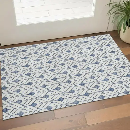 Blue And Ivory Geometric Washable Area Rug With UV Protection Photo 1