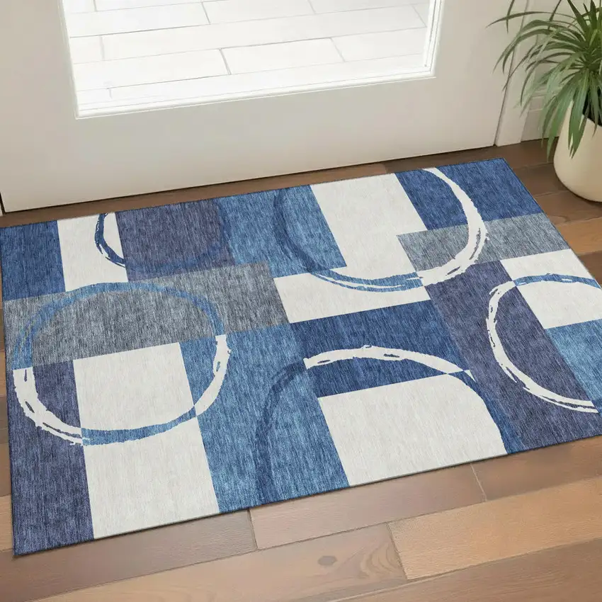 Blue And Ivory Geometric Washable Area Rug With UV Protection Photo 1