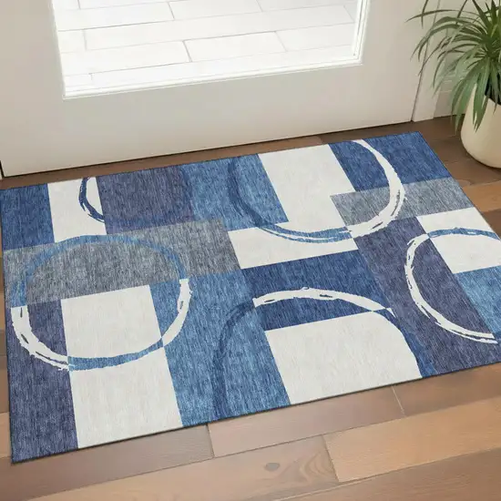 Blue And Ivory Geometric Washable Area Rug With UV Protection Photo 1